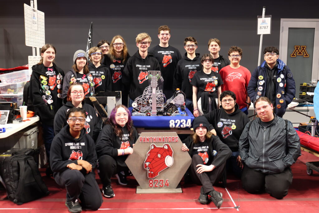 A group photo of our robotics team, taken at the end of our competition during the 2022 season "CHARGED UP".